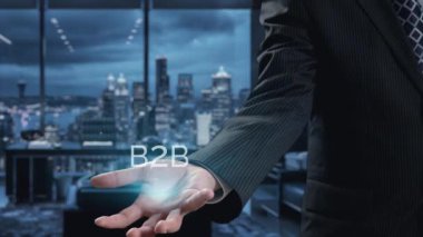 İş adamı B2B peyzajında geziniyor, iş-iş bağlantılarını geliştirmek için kullanım teknolojisi kullanıyor. B2B etkileşimini yeniden şekillendiren keşifler, iş-iş stratejilerinde yenilikleri yönlendiren araçlar. Kullanıcı Kimliği