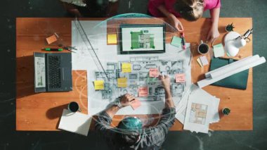 İnşaat mühendislerinin planlama ve yazma alanlarının en alt basamakları. Mimarlar, küresel ağ iletişimi ya da büyük veri tabanına sahip bina inşaatı için birlikte çalışıyorlar. Sempozyum.