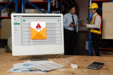 Cyber attacking concept. Malware alert showing on computer screen display scam and threat detection on computer system or online server to be removed snugly.