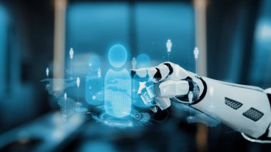 Gelecekçi robot bir el holografik insan figürleriyle etkileşime geçmek için uzanır, gelişmiş teknoloji ve yapay zekayı şık bir ofis ortamında sergiler. Auvana