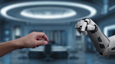 Bu video insan eliyle robotik el arasındaki sembolik bir etkileşimi gösteriyor, teknoloji odaklı bir çalışma alanındaki maliyet ve kalite dengesini vurguluyor. Auvana