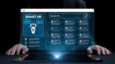 Bu resim yapay zeka teknolojisinden yararlanan gelecekteki insan kaynaklarını gösteriyor. Dijital arayüz verimli çalışan yönetimi ve veri analizine olanak sağlıyor. Dörtgen