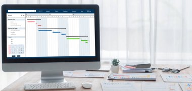 Ekip projesinin zaman çizelgesini gösteren bilgisayar ekranında canlı iş projesi yönetimi için proje planlama yazılımı