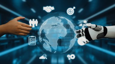 Bir insan eli dijital bir dünya haritasının arka planına karşı robotik bir ele uzanıyor, modern bir ortamda teknoloji işbirliğini ve yenilikçi ortaklıkları simgeliyor. Auvana