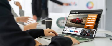 car rental website on computer screen for tourist to rent a car for transportation snugly