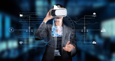 Sanal gerçeklik teknolojisiyle ilgilenen bir profesyonel, siber güvenlik önlemleri ve veri koruma stratejilerini şık, dijital bir iş ortamında keşfediyor. XDMCP