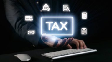 Bu resim, dijital araç ve hizmetleri simgelerle resmeden, finansal uygulamalarda verimlilik ve yenilikleri vurgulayan, vergi idaresine çağdaş bir yaklaşımı tasvir etmektedir. Dörtgen