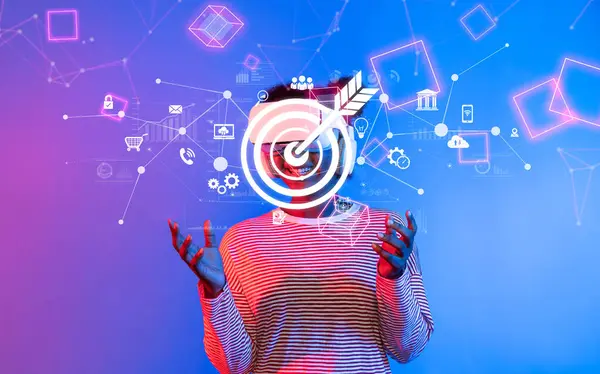 Bu büyüleyici görüntü, canlı dijital grafikler ve iş unsurları ile çevrimiçi pazarlamada hedef alma kavramını gözler önüne sererek strateji ve katılımı vurguluyor. XDMCP