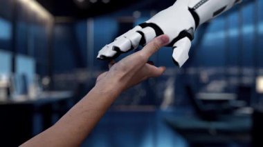 Modern bir ofiste parlayan dijital simgelere uzanan bir el beliriyor. Bu video teknoloji, bağlantı ve iş dünyasındaki yeniliği sembolize ediyor. Auvana