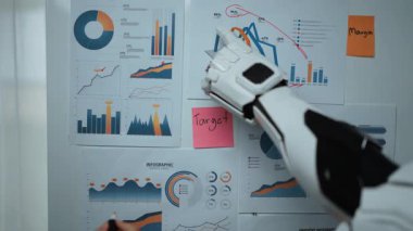 Modern bir ofisteki yapay zeka işbirliği, veri destekli pazarlama anlayışlarını körüklüyor ve profesyonellerin iyi bilgilendirilmiş iş kararları almalarına olanak sağlıyor. Noogenesis Yapay Zeka