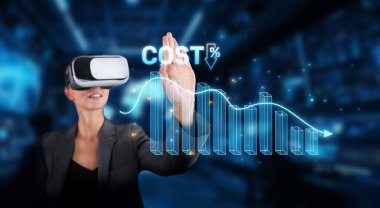 Profesyonel bir kadın, finansal verilerle etkileşimde bulunmak, maliyet azaltma eğilimlerini ve çağdaş ofis ortamında veri görselleştirmesini göstermek için sanal gerçeklik teknolojisini kullanır. XDMCP