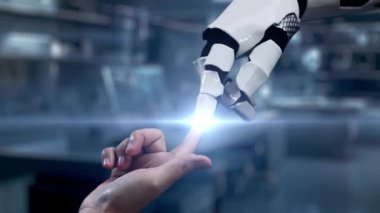 Robot ve insan elini uzatıyorlar ve kalp hologramıyla hareket ediyorlar. Bulanık laboratuvar geçmişini işaret ederken robot el ve insanın birlikte çalışmalarına yakın çekim. Sağlıklı..