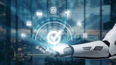 Teknoloji simgeleriyle çevrili, modern ofis ortamında yenilik ve verimliliği simgeleyen parlayan bir işaret yayan robotik bir elin yakın çekimi. Auvana