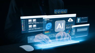 Bu görüntü, yenilikçi veri analizlerini ve modern çalışma alanındaki dinamik dijital arayüzlerle kullanıcı etkileşimlerini gösteren yapay zeka teknolojisinin özünü yakalar. Dörtgen