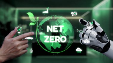 Bu resim teknolojinin ve sürdürülebilirliğin yenilikçi kesişimini, insan ve robot bir elin net sıfır emisyon kavramına bağlanmasını tasvir eder. Auvana