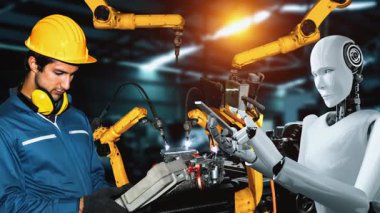 Cybernated industry robot and human worker working together in future factory . Concept of artificial intelligence for industrial revolution and automation manufacturing process .