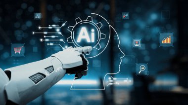 Fütürist bir robot el, modern ortamlarda teknoloji, veri ve yenilikleri temsil eden çeşitli dijital simgelerle çevrili parlayan bir yapay zeka sembolüne işaret eder. Auvana