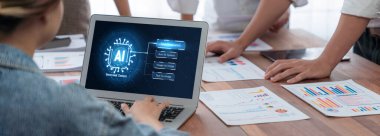 Yapay zeka teknolojisini çalıştırmak için komut mühendisi ve kullanıcı kolaylığı için üretici yapay zeka yardımcı araçları insanların yapay zeka hareketini teşvik ederek üretken yapay zeka fonksiyonları ile çalışmasına yardımcı olur