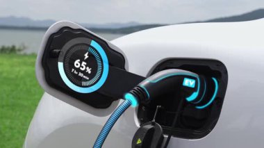Elektrikli araba şarj istasyonuna bağlanır, EV şarj kablosu ile pili şarj edilir doğası gereği akıllı dijital batarya durum hologramı görüntülenir. Geleceğin yeşil enerji altyapısı. İnceleyin