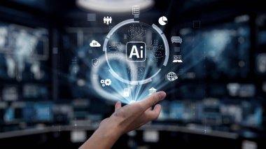 Bir el, insan etkileşimi ve dijital teknoloji arasındaki bağlantıyı sembolize eden yüksek teknolojili bir ortamda yüzen yapay zeka simgelerine uzanıyor. Auvana