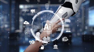 Gelecekçi robotik bir kol insan eliyle tokalaşıyor. Teknoloji grafikleriyle dolu dijital bir ortamda insanlar ve yapay zeka arasındaki işbirliğini simgeliyor. Auvana