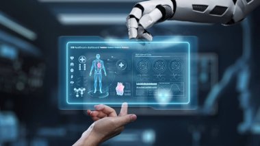 Robot ve insan eliyle insan anatomisi ikonunu işaret ediyor. Robot el ve insanın birlikte çalışırken röntgen hologramıyla bulanık labaratuvarı işaret etmesine yakın çekim. Sağlıklı..
