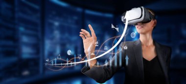 Profesyonel bir iş kadını, gelişmiş grafikler ve grafikler yoluyla finansal büyüme, yatırım stratejileri ve başarı ölçülerini görselleştirmek için sanal gerçeklik teknolojisine başvurur. XDMCP