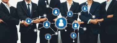 Takım Elbiseli İş Adamları ile Profesyonel Ağ Kavramı Dijital Düğümler ve İlişkiler ve İşbirliği Sunan Kullanıcı Simgeleri aracılığıyla Bağlanıyor. Dostluk