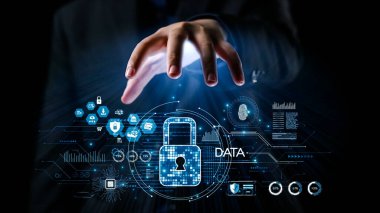 Modern teknolojide veri güvenliğinin ve mahremiyetin önemini temsil eden dijital kilit sembolüne uzanan bir eli büyüleyici bir görsel. Dörtgen