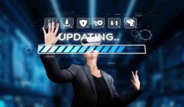 Güncelleme sürecinin ortasında bir kullanıcı sanal gerçeklik teknolojisiyle etkileşime geçerek, modern bir bilgisayar ortamı ve geleceksel tasarım elementleri sergiliyor. XDMCP