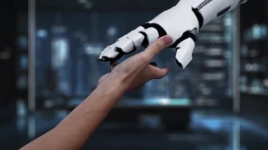 Bir el, insanları ve bağlantıları temsil eden soyut simgelerin yer aldığı dijital ekrana uzanıyor. Bu görsel olarak çarpıcı video ağ ve teknolojiyi temsil ediyor. Auvana