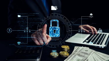 Bu resim, güvenli veri koruması kavramını gösteriyor. Bir dizüstü bilgisayarda dijital kilit ve nakit para, mali işlemler ve yatırımlarda güvenliğin önemini gösteriyor. Dörtgen