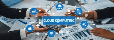 Bu resim, profesyonellerin bulut hesaplama ve veri analizinde yer aldığı, takım çalışmasını ve karar verme mekanizmasında teknolojiyi vurguladığı modern bir ofis ortamını sergiliyor. Dostluk