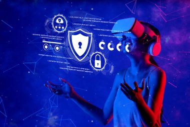 Bir kadın sanal gerçeklik kulaklığı kullanıyor, siber güvenliği temsil eden yüzen simgelerle meşgul, çevrimiçi güvenlik ve veri korumanın teknolojideki önemini vurguluyor. XDMCP