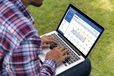 Calendar on computer software application for schedule planning for personal organizer and online business snugly