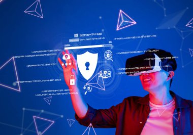 Bir kişi karmaşık siber güvenlik kavramlarını incelerken sanal gerçeklik teknolojisiyle ilgilenir, modern bir dijital ortamda veri koruması ve çevrimiçi gizliliğe odaklanır. XDMCP