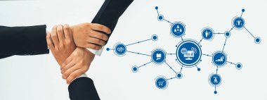 Dijital bir ağ üzerinde el ele tutuşan iş birliğinin görsel temsili, modern bir girişim ortamında takım çalışmasını ve yeniliği sembolize ediyor. Dostluk