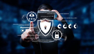 Gelişmiş dijital gizlilik arayüzü ile etkileşime giren bir siber güvenlik uzmanı, modern iş teknolojisinde veri koruması ve çevrimiçi güvenliğin önemini vurguluyor. XDMCP