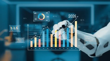 Fütüristik bir robot el modern bir ofiste dinamik veri görselleriyle ilgilenerek büyüme eğilimlerini, analitiği ve iş anlayışı ve stratejisi projeksiyonlarını gözler önüne seriyor. Auvana