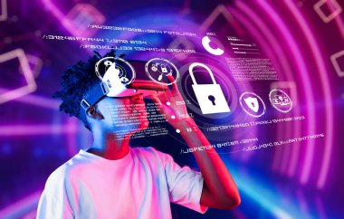 Bu canlı görüntü, günümüz dijital ortamında veri gizliliği ve korunmasının önemini vurgulayarak, gelişmiş teknolojiyi kullanarak siber güvenlik kavramlarını keşfeden bir kişiyi gösteriyor. XDMCP