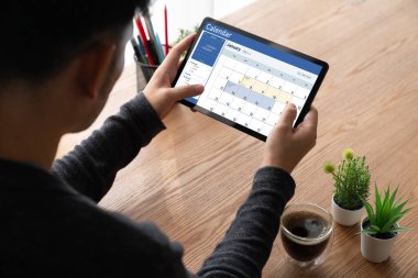 Calendar on computer software application for schedule planning for personal organizer and online business snugly