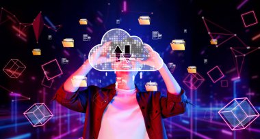 Bulut hesaplamasının dinamik bir görsel temsili, dijital depolama simgeleriyle etkileşen bir kullanıcıyı canlı, fütüristik bir ortamda gösteriyor. Teknoloji teması için mükemmel. XDMCP