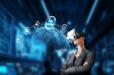 Bir iş adamı sanal gerçeklik kulaklığı kullanır, veri odaklı bir dünyaya dalmıştır. Bu resim online iş ve analizler üzerinde teknolojik etkiyi gösteriyor. XDMCP