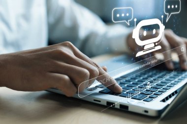 Bir kullanıcı, günlük işlerde yapay zekanın entegrasyonunu gösteren bir sohbet robotuyla dizüstü bilgisayarda etkileşime girer. Bu sahne iletişimdeki teknolojik rolü vurguluyor. XDMCP