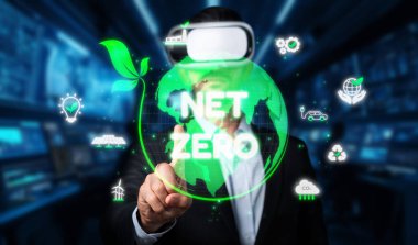 Bir işadamı, sürdürülebilir yeşil enerji ve iklim direncini vurgulayarak, net sıfır karbon emisyonu elde etmek için yenilikçi çözümler keşfetmek için sanal gerçeklikle uğraşır. XDMCP