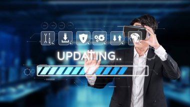 VR kulaklık takan bir profesyonel, teknoloji ve geliştirmedeki gelişmeleri temsil eden bir yazılım ilerleme çubuğunu gösteren modern bir dijital arayüzle etkileşime girer. XDMCP