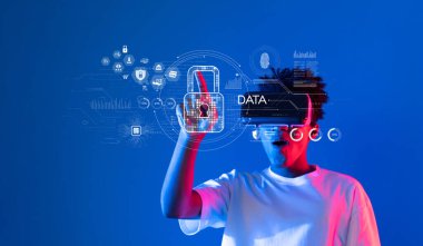 Veri güvenliği ve siber koruma kavramlarının dijital temsilleriyle ilgilenen genç bir birey, modern dijital ortamda bilginin korunmasının önemini gösteriyor. XDMCP