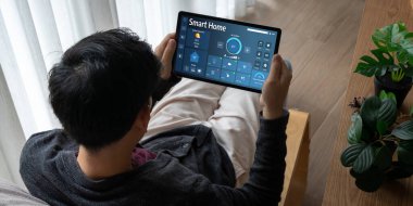 Smart home technology, centric remote control system with digital dashboard for air conditioning, safety security network or house automation. App software, ui panel programming IOT monitor snugly