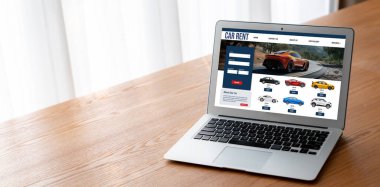 car rental website on computer screen for tourist to rent a car for transportation snugly