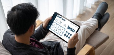 Smart home technology, centric remote control system with digital dashboard for air conditioning, safety security network or house automation. App software, ui panel programming IOT monitor snugly